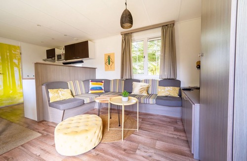 Otterlo Ski Chalet | Cheerful mobile home near Park De Veluwe