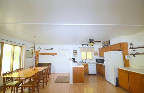 Great Cacapon House | Chesnutt Cabin - riverfront, fire pit, fireplace, game room, king bed