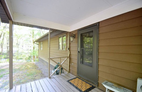 Great Cacapon House | Chesnutt Cabin - riverfront, fire pit, fireplace, game room, king bed