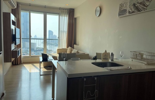Bang Rak Apartment | Chic 1-bedroom with AC, WiFi, fitness room in vibrant Krung Thep