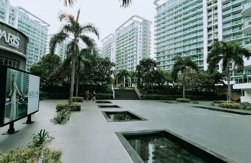 Taguig Condo | Chic 2-bedroom condo with AC, WiFi in enchanting Parañaque