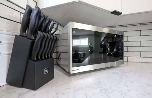 Grande Prairie Apartment | Chic 2BR Suite Smart TV Free WIFI Parking