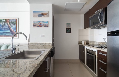 Juan Dolio - El Pueblo Apartment | Chic Beachfront Apt. W/5 beds Las Olas Juan Dolio