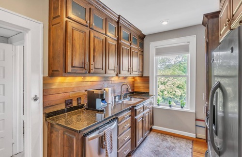 Greenville Downtown Apartment | Chic Downtown 2BR Condo walk to The Well Arena