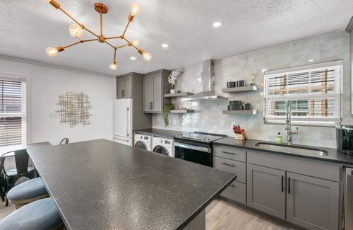 College Station Apartment | Cinema: 2 Bedroom, Walk to A&M, Comfy King Beds