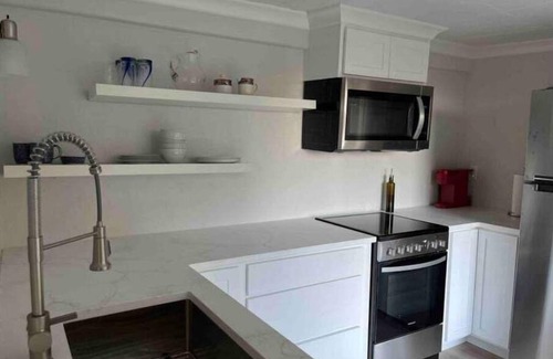 Rockwood Apartment | City Apartment in a Mediterranean home with Spectacular views