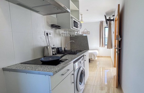 Corralejo Apartment | City Center Coastal Studio, Ocean View, Pool, WiFi