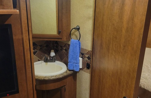 Ocoee House | Class A motorhome. In our backyard or a local RV resort.