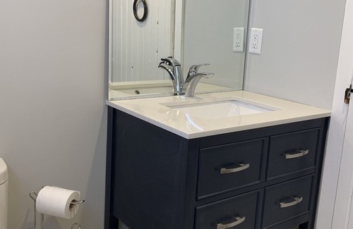 Abbotsford House | Clayburn Village, comfortable character brick home