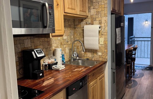 Gatlinburg Condo | Clean Condo, Walk to Everything! Back Stairs Take You Right to Downtown!