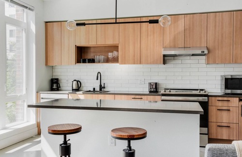 Squire Park Apartment | Clean First Hill 1BR w/Pet Spa, W/D, Gym, & Lounges, by Blueground