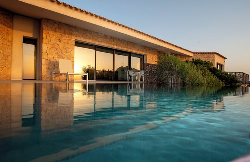 Costa Paradiso Villa | Clifftop design villa with infinity pool facing the sunset