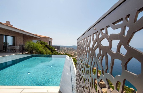 Costa Paradiso Villa | Clifftop design villa with infinity pool facing the sunset
