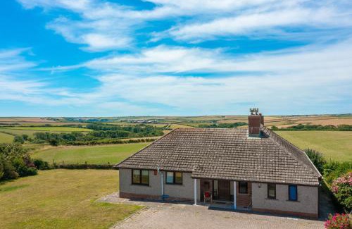 St Ishmaels House | Coastal Bungalow Near Marloes with Log Burner and Garden