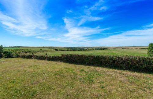 St Ishmaels House | Coastal Bungalow Near Marloes with Log Burner and Garden