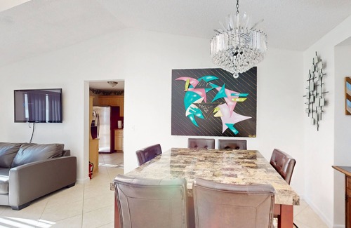 Whisper Walk House | Colorful dog-friendly home with pool, grill, work desks, internet, AC, & W/D