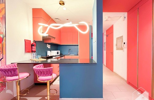 Dubai Sports City Apartment | Colorful Studio with Balcony & City Views