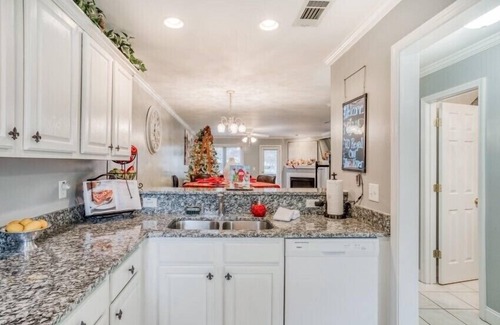 Helen House | Come visit Santa at “Regal On The River” with Hot Tub in Downtown Helen 🎄