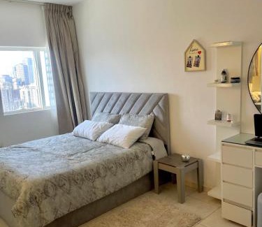 Al Nahda Apartment | Comfortable Apartment Bedroom And Spacious Living Room Family and Couple