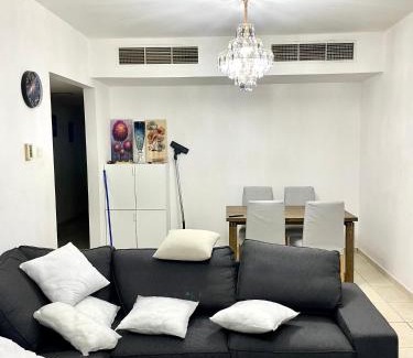 Al Nahda Apartment | Comfortable Apartment Bedroom And Spacious Living Room Family and Couple