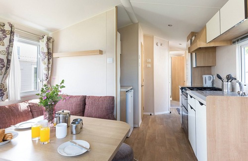 Looe House | Comfortable family caravan with one double and one twin.