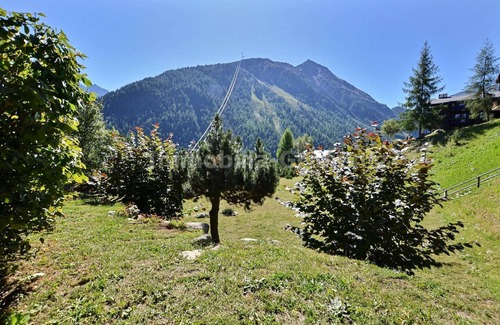 Grimentz Apartment | Comfortable flat for 2 to 4 people, living room with 1 divan bed (140), kitchen area with dishwasher