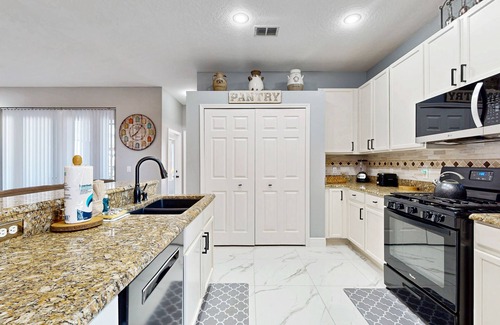 Crescent Lakes House | Comfortable home with private pool, central AC, washer/dryer & patio