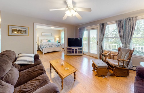 Owls Head House | Comfy, one-level home with partial water view, deck, fast WiFi, grill, & W/D