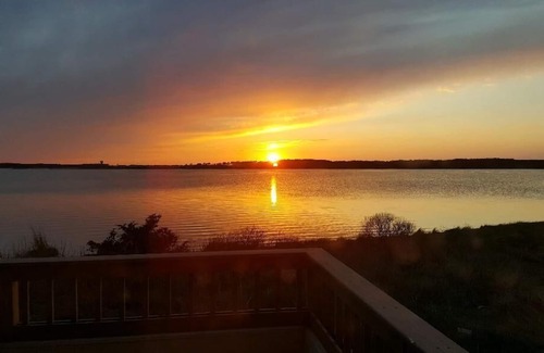 Fenwick Island House | Complimentary activities, a $300 WEEKLY value! End unit 3 bedroom, 3.5 bath bayfront townhome featuring luxurious accommodations.