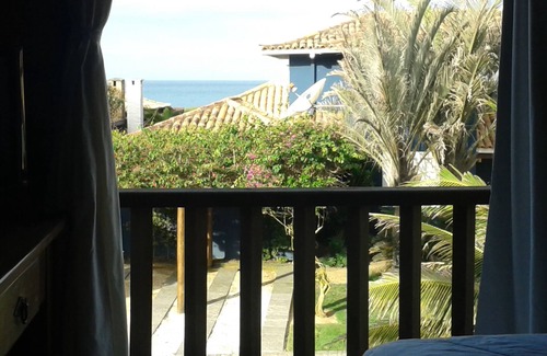 Praia Rasa House | Condo house 4 suites on the sand of Manguinhos beach, comfort and cosiness!