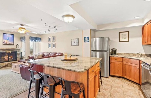 Stratton Mountain Condo | Condo just steps from Tamarack Lift - Cozy up by the fireplace!