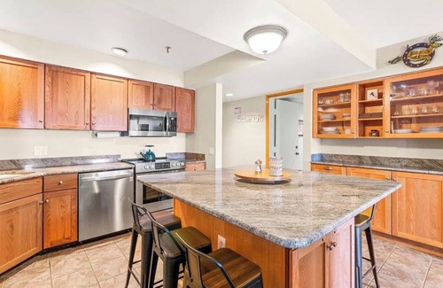 Stratton Mountain Condo | Condo just steps from Tamarack Lift - Cozy up by the fireplace!