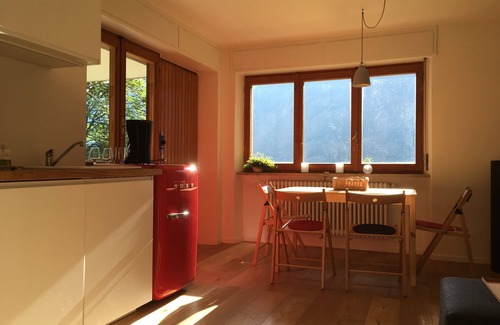 Paquier Apartment | Contemporary apartment with wood burning stove and private terrace with mountain views