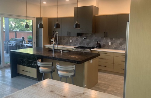 Vernon House | Contemporary Beachfront Home with Hot Tub and Sand Beach