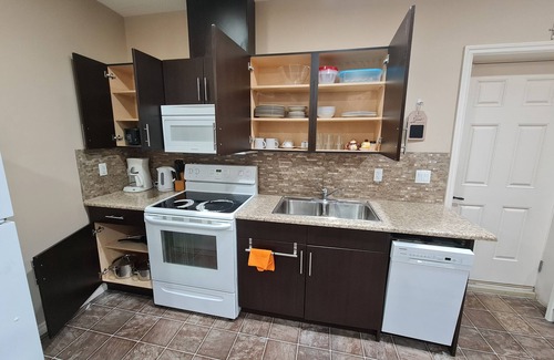 Southeast Edmonton House | Contemporary & Cheerful 1-Bedroom Suite with Fireplace