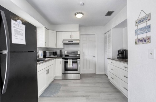 South Daytona House | Coquina Cabana with fenced yard and adorable decor