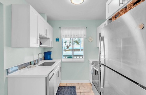 Anna Maria House | Coquina Cottage A by Duncan Real Estate