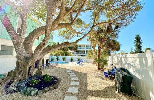 Anna Maria House | Coquina Cottage A by Duncan Real Estate