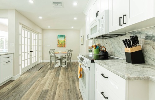 Coquina Sands House | Coquina Sands - Newly renovated - outdoor entertaining oasis w/TV & heated pool - 2 Blocks to Beach!