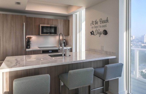 Central Beach Condo | Corner Penthhouse, only steps to the beach