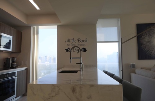 Central Beach Condo | Corner Penthhouse, only steps to the beach