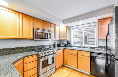 Loyal Heights House | Corner Townhome with Deck, Tons of Natural Light, WiFi, & Gas Fireplace