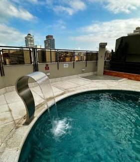 Gonzaga Hotel | Cosmopolitan PRAIA Flat com Estacionamento Incluso - Gonzaga - Ap 76