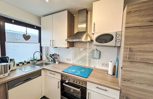 Westeraccumersiel Apartment | Cosy apartment for 2 guests with WIFI, TV, balcony, pets allowed and parking
