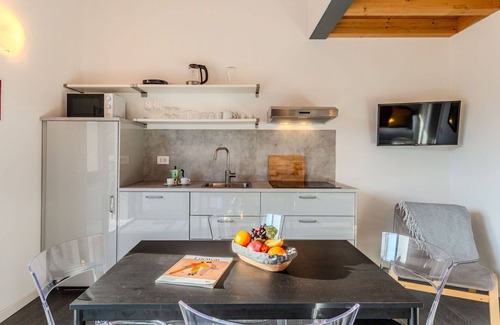 Dervio Apartment | Cosy apartment for 4 people with pool, WIFI, A/C, TV, patio and panoramic view