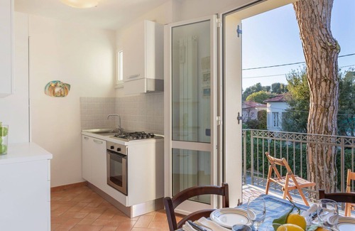 Marina di Pietrasanta Apartment | Cosy apartment for 6 people with TV, balcony and pets allowed