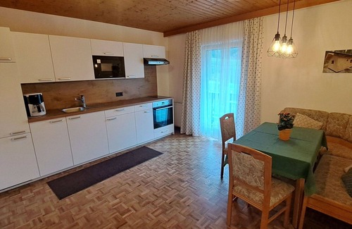 Oberwang Villa | Cosy apartment in villa for 5 guests with WIFI, TV and balcony