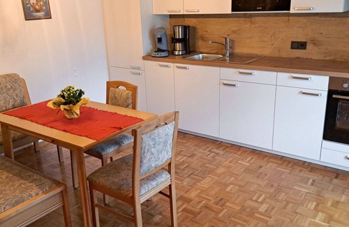 Oberwang Villa | Cosy apartment in villa for 5 guests with WIFI, TV and balcony