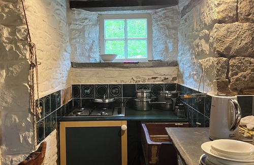 Margam Cottage | Cosy, colourful farm cottage