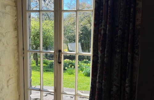 Margam Cottage | Cosy, colourful farm cottage